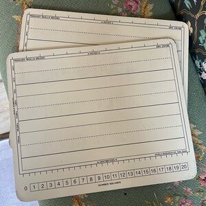 Two vintage primary skills dry erase boards